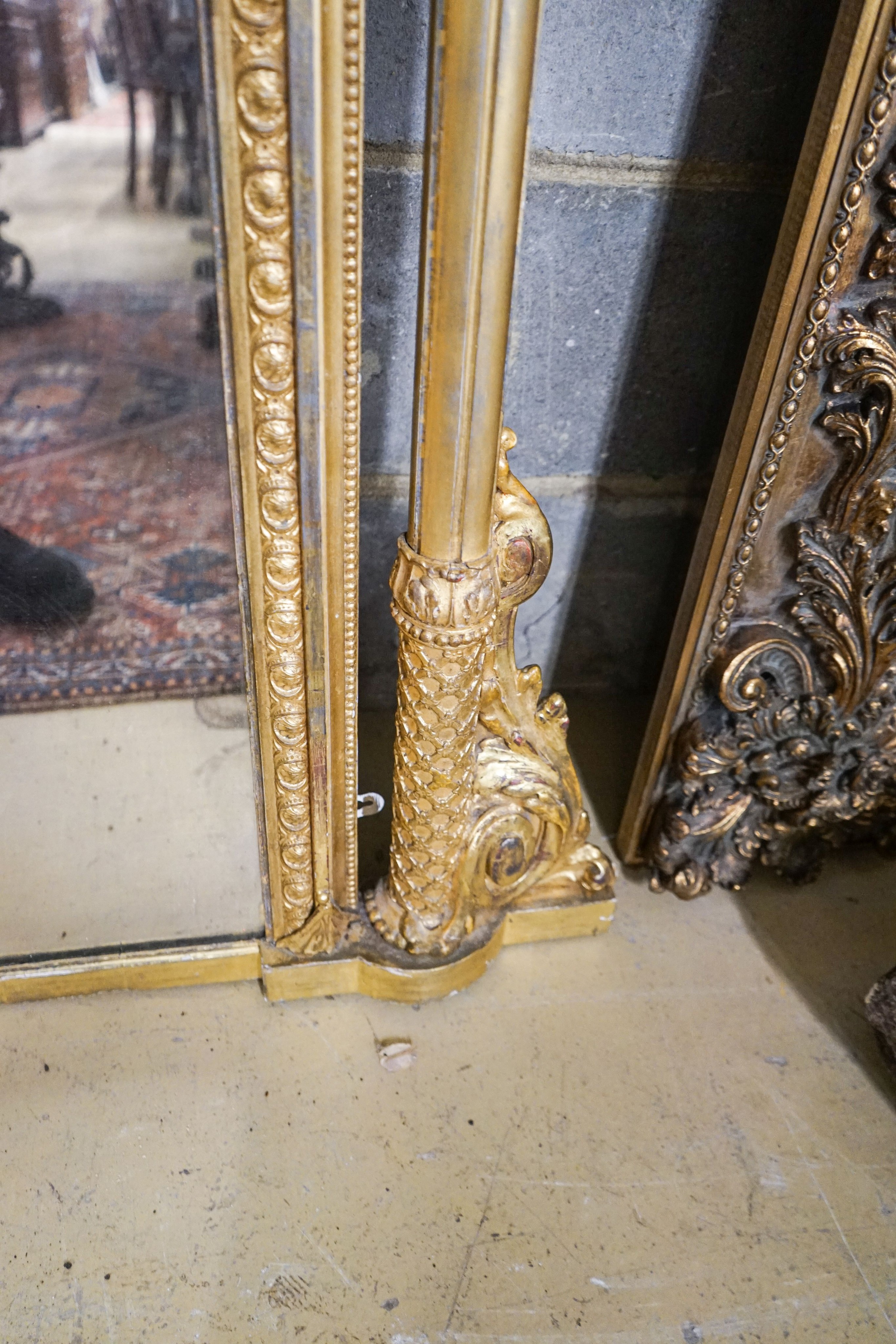 A Victorian carved giltwood and gesso overmantel mirror, the plate flanked by fluted columns, width 155cm, height 178cm